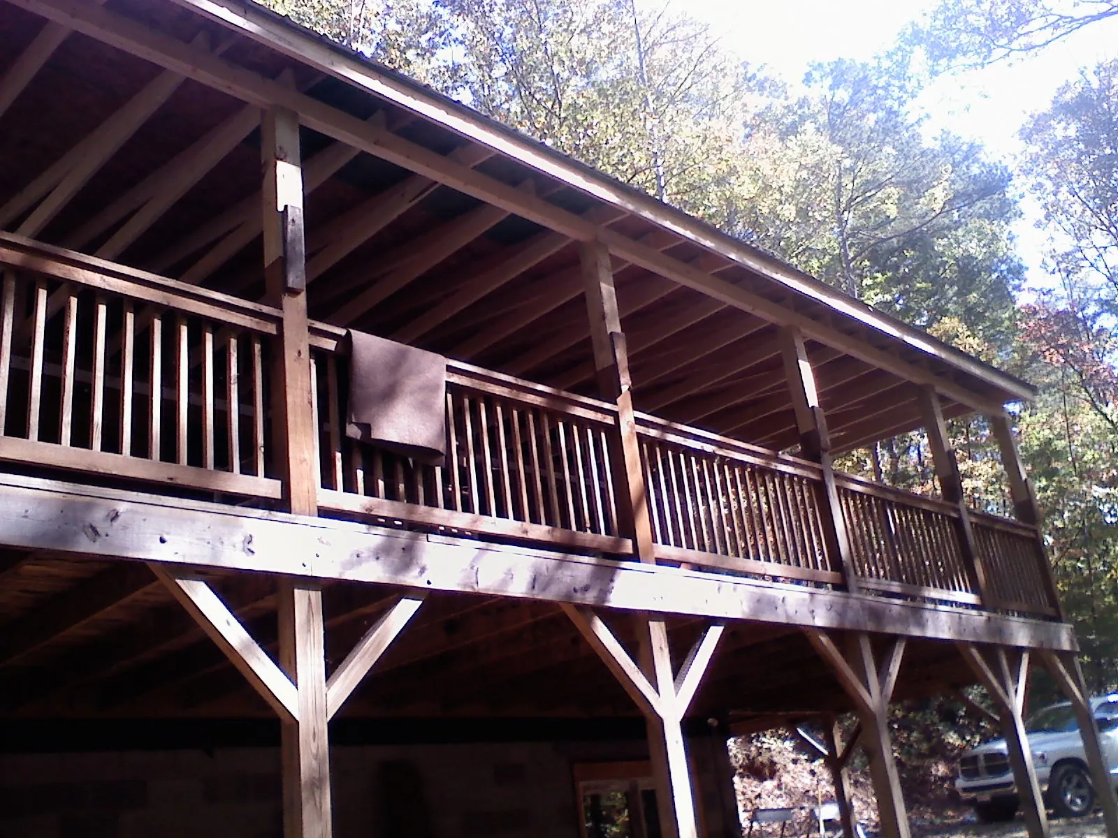 Timber framing under a new elevated porch and deck — Roof Leak Repair in New Eagle by Roofing Brothers